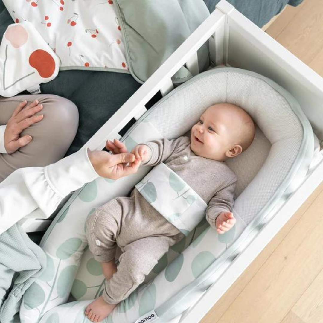 Doomoo - Baby Nest din bumbac organic Cocoon Leaves Aqua Green - gogobaby.ro