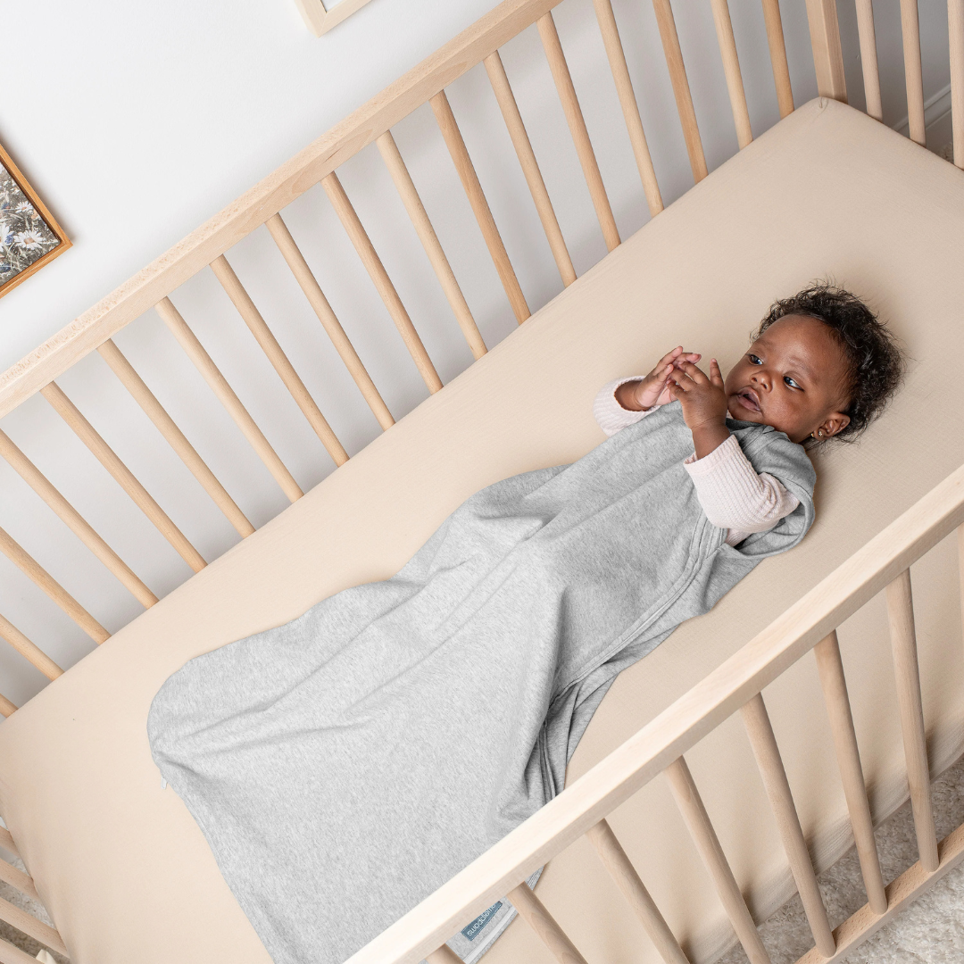 Ingenuity - Sac de dormit Swaddle Me Night Sack Sleeper, 3-18 luni, Sunset Space