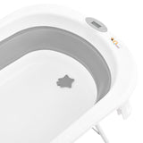 Cadita de baie pliabila, Qmini, Foldy Pro Care, Cu suport metalic si masuta de infasat, Cu termometru electronic, Cu dop si furtun pentru scurgere, Antiderapanta, 80×49 cm, Alb/Gri