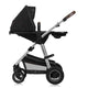 Carucior 3 in 1, Lionelo, Amber, Cadru aluminiu, Cu landou intarit si salteluta moale, Cu scoica auto testata ADAC, Reversibil, Cu accesorii, Geanta parinti, Pana la 22 kg, Negru silver