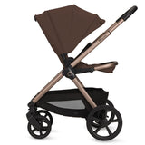 Carucior 3 in 1, Lionelo, Carmine, Cu scoica ADAC, Landou anti-reflux, Salteluta ventilata, Reglare spatar in 3 pozitii, Suport de picioare in 3 pozitii, Maner reglabil in 5 pozitii, Sustine 22 kg, Cu accesorii, 0 luni+, Ciocolatiu