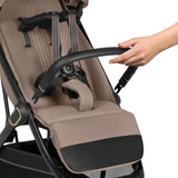 Carucior sport, Lionelo, Bess, Sustine 22 kg, 6 luni+, Capotina impermeabila si protectie SPF 50+, Include suport sticla, Pliere cu o singura mana, Maner pentru transport, Bej