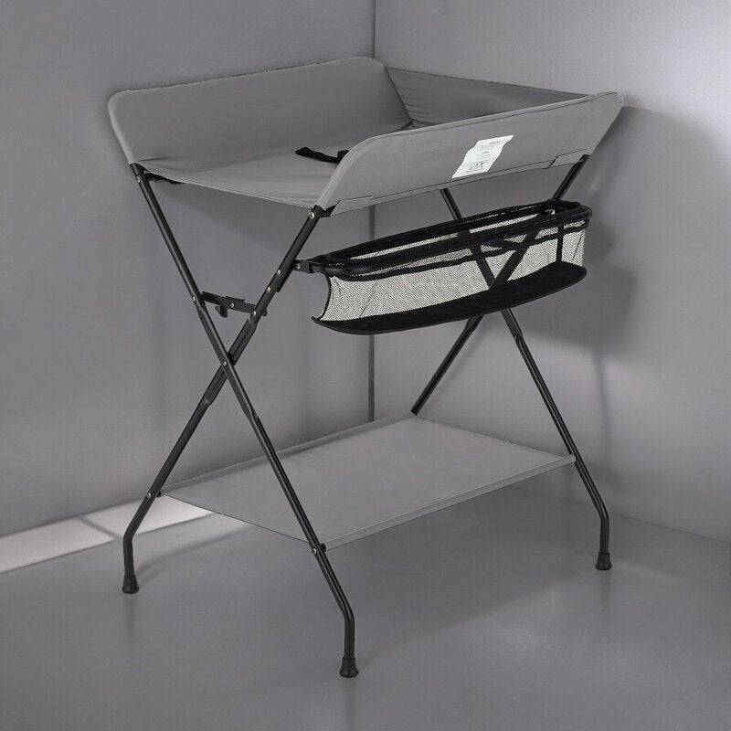 Masuta pentru infasat si schimbat scutece, Feedo, Multifunctionala, Pliabila, Cu raft pentru depozitare si compartiment lateral, Realizata din fier, panza si in, 80.5 x 67 x 102.5 cm, Gri - gogobaby.ro