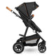Carucior 3 in 1, Lionelo, Amber, Cadru aluminiu, Cu landou intarit si salteluta moale, Cu scoica auto testata ADAC, Reversibil, Cu accesorii, Geanta parinti, Pana la 22 kg, Gri Inchis