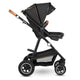 Carucior 3 in 1, Lionelo, Amber, Cadru aluminiu, Cu landou intarit si salteluta moale, Cu scoica auto testata ADAC, Reversibil, Cu accesorii, Geanta parinti, Pana la 22 kg, Gri Inchis
