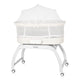 Patut balansoar, Lionelo, Coral, Cu landou ergonomic detasabil, Functie de balansare integrata, Functie de cantar, Sunete si cantece de leagan, Cu roti, Panou tactil sau telecomanda, 0-9 kg, EN 1130:2019+AC:2020,EN 16890:2017+A1:2021, Alb