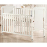 Patut din lemn bebe, 120x60 cm, Cu laterala culisanta, Din pin si mdf, Cu roti, Sina dentitie, Stabil si rezistent, White, FreeON, Mia