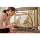 Patut pliant, Lionelo, Laura, 102 x 74 cm, Cu doua nivele, Functie de tarc, Cu roti, Include salteluta si geanta de transport, Pereti din plasa, Deschidere laterala, Pana la 15 kg, 0 luni +, Verde