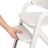 Scaun de masa multifunctional Celia Close&Cosy, Lionelo, Din lemn de fag, 6 luni- adult, Reglabil pe inaltime, Spatar lat, Sezut ergonomic, Tavita silicon, Suport de picioare reglabil, Greutate maxima 90 Kg, Alb